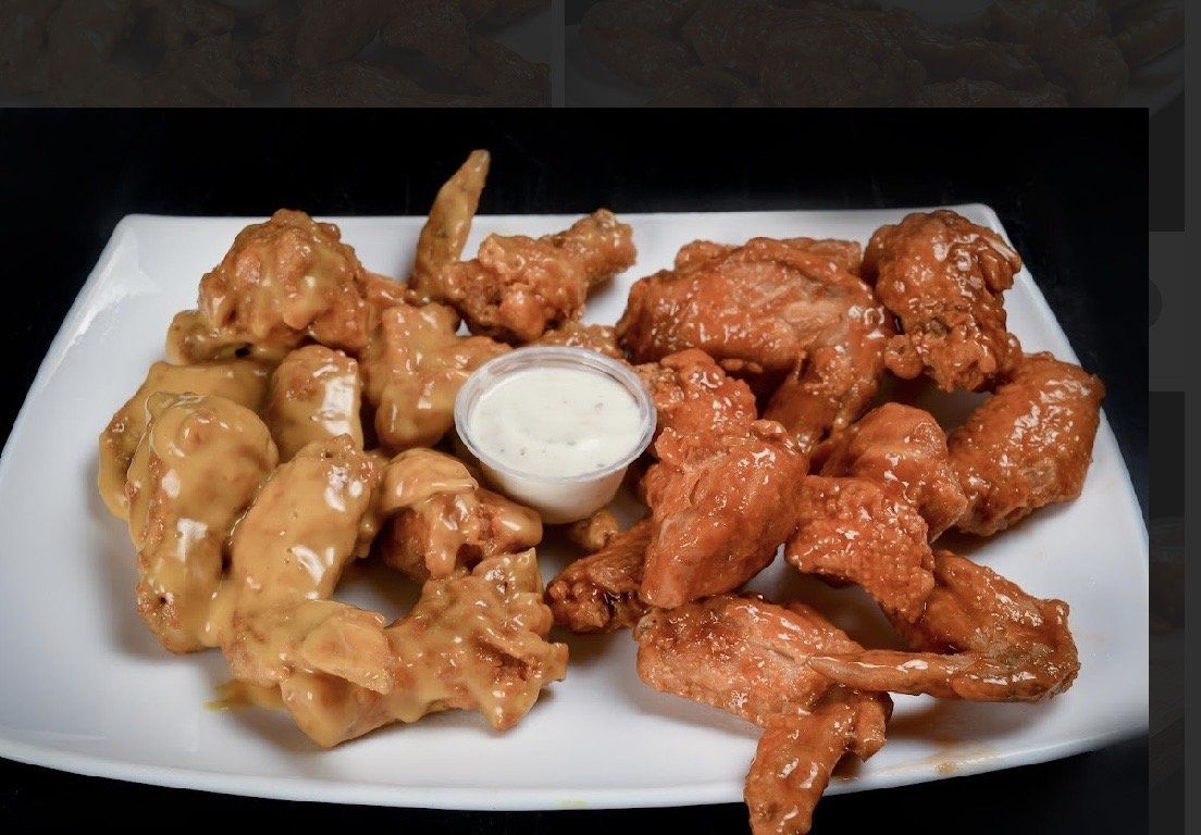 1 KG Alitas de Pollo Bañadas en Salsa a Elegir